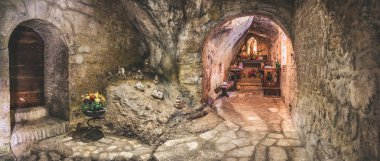 cavern church of Santa Maria Infra Saxa in the Frassassi and Valadier temple area - Marche region - Italy clipart