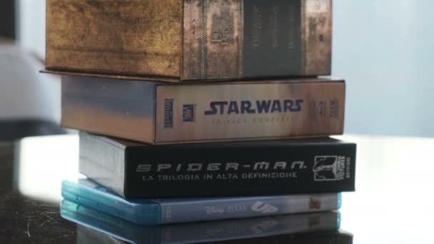 Passion for cinema, a stack of movie collection in blue ray disc — Stock video