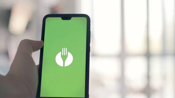 TheFork app and The Fork symbol on a smartphone — Stock Photo, Image