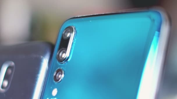 Telefone câmera comparação fundo close-up — Vídeo de Stock