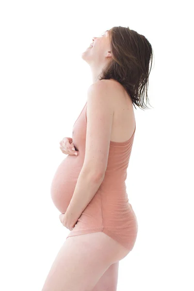 Sylwetka kobiety w ciąży w kamizelce po prysznicem — Zdjęcie stockowe