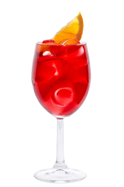 Wineglass with red fruit coctail close-up