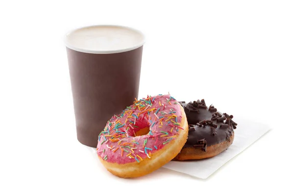 Xícara de café com saborosos donuts isolados — Fotografia de Stock