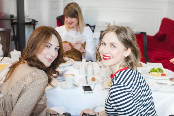 Elegant women in restaurant