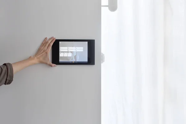 Smart home control on tablet on the wall — Stock Photo, Image