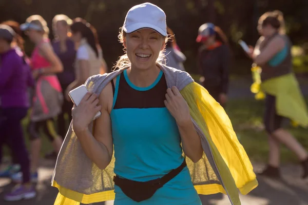 Mujer alegre en ropa deportiva — Foto de Stock