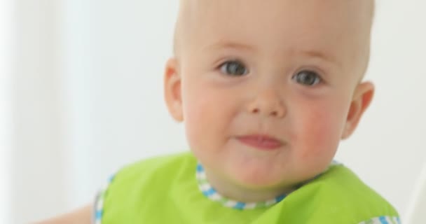 Parent feeding infant child — Stock Video