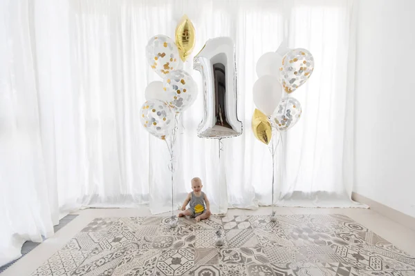 Cute baby with festive balloons — Stock Photo, Image