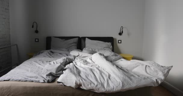 Zoom gray bedroom empty messy gray bed — Stock Video