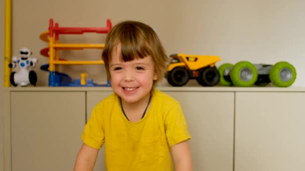 Adorable little boy tells about herself on camera — Stock Video