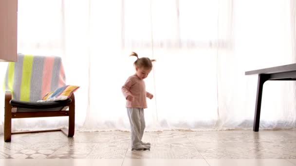 Child spinning in dance at home — Stock Video