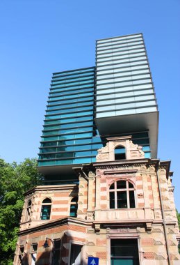 Strange building (blending architectural styles) in Bucharest, Romania clipart