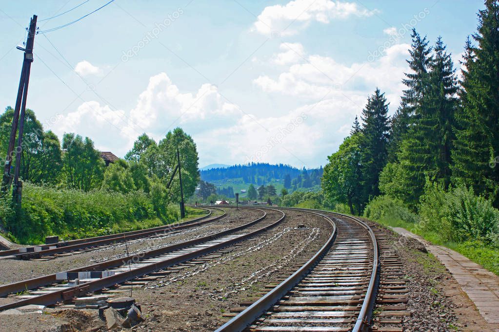 Landscape in Vorohta with mountains, river and railroad, Ukraine