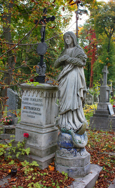 Ancient tombstone (sculpture) at the Lychakiv Cemetery in Lviv, Ukraine