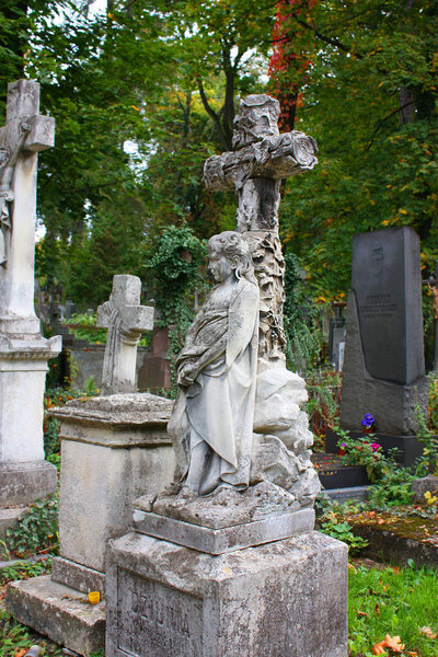 Ancient tombstone (sculpture) at the Lychakiv Cemetery in Lviv, Ukraine