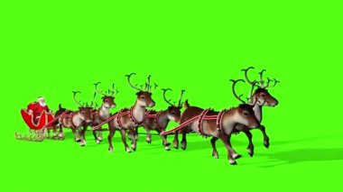 Noel Baba, geyik tarafından çekilen bir kızakta hediyeler taşıyor. Yeşil arkaplanda döngü videosu