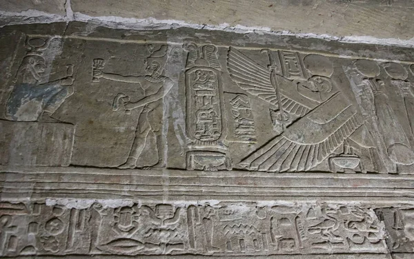 Mysterious murals on the walls of the Temple of Dendera Hathor , near the city of Ken.