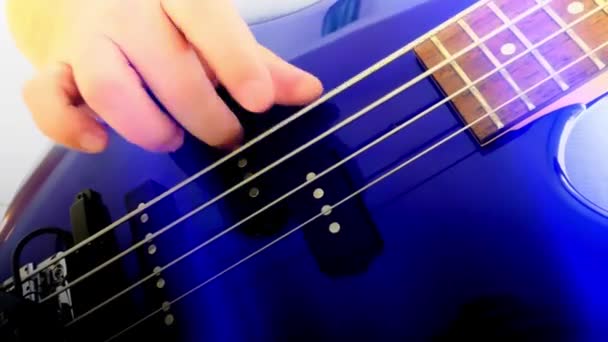 Guitarist Plays Rock Bass Guitar Abstract Bass Guitar Close Light — стокове відео