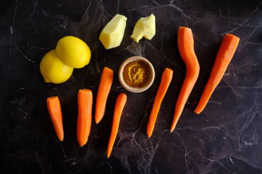 Vitamin takviyesi, havuç, zencefil, limon, altın süt. Sağlıklı meyve ve sebze karışımı. Dokunulmazlık desteği.