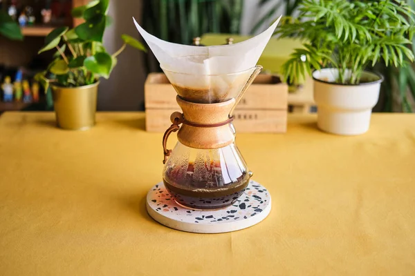 Chemex filter coffee brewing method. Brewing coffee at home. Concept for home baristas.