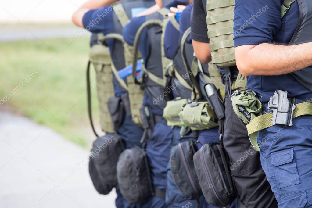 law enforcement training team with tactical equipment and tactic