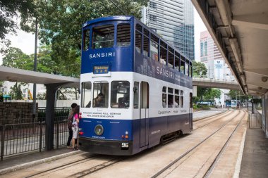 Hong Kong S.A.R. - July 13, 2017: Double decker tram or Ding Ding on the street in Causeway Bay Hong Kong. Hong Kong tramways is one of the earliest forms of public transport in the metropolis clipart