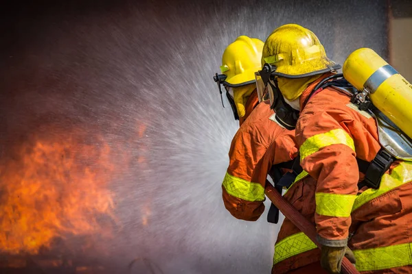 Firefighters Spraying High Pressure Water Fire Copy Space — Stock Photo, Image