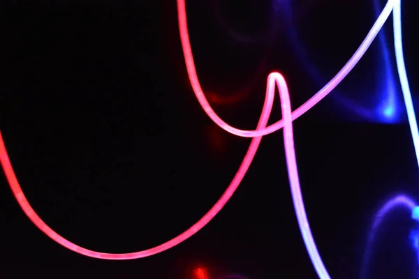 Rode Blauwe Lichtdraad Een Lichtgeleidingsdraad Met Verschillende Lichttransmissie Lichtspectrum Lichteffecten — Stockfoto