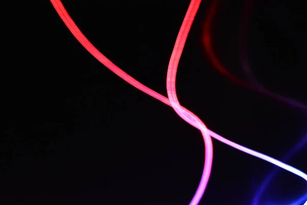 Rode Blauwe Lichtdraad Een Lichtgeleidingsdraad Met Verschillende Lichttransmissie Lichtspectrum Lichteffecten — Stockfoto