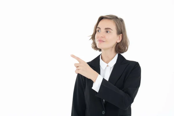 Retrato de jovem empresária apontando para o lado direito , — Fotografia de Stock