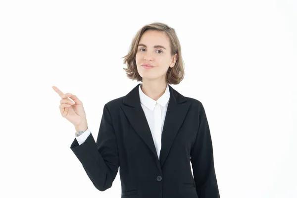 Retrato de jovem empresária apontando para o lado direito , — Fotografia de Stock