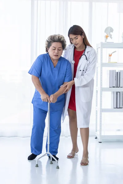 Young Attractive Asian Doctor Helping Old Patient Walking Hospital Healthcare — Stock Photo, Image