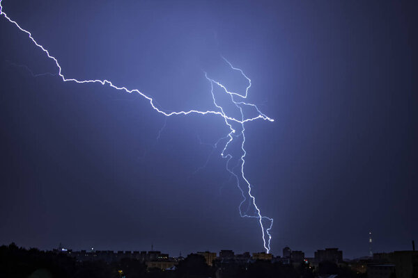 Bright amazing lightning over the city