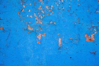 Duvardaki eski kabuk soyma boyası. Yakın plan.