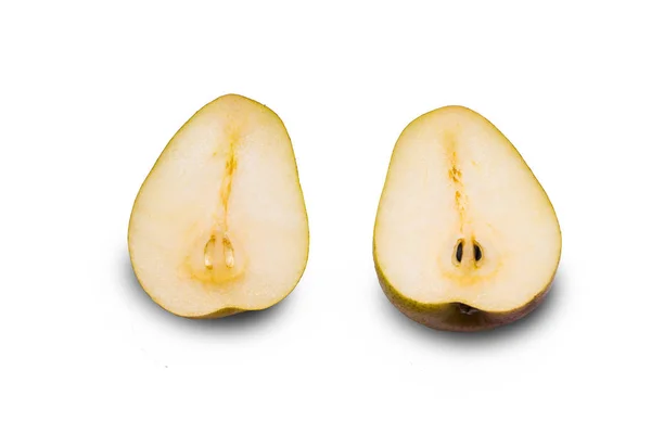 Pear cut in two isolated on a white background. Two half pears close-up isolated on a white background
