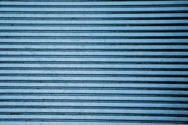 Çizgili mavi metal plaka dokusu kapat