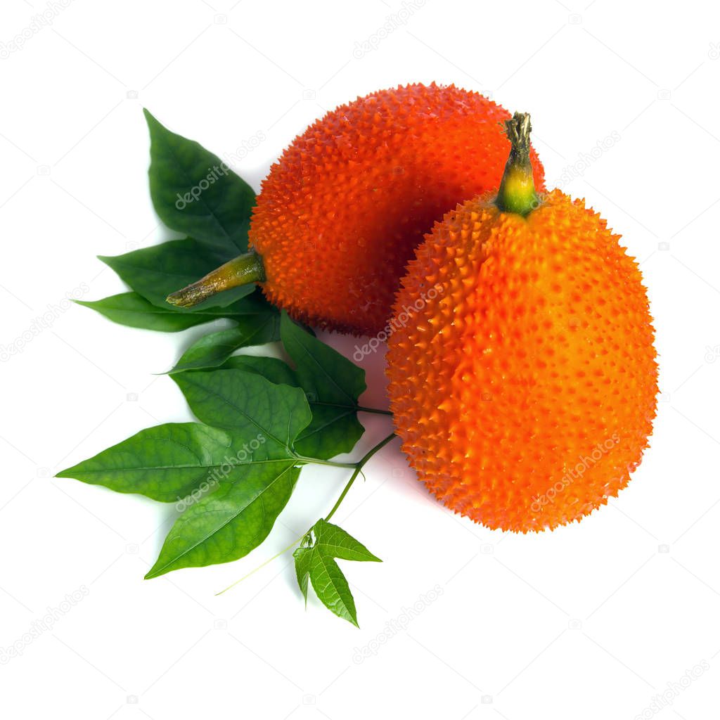 Gac fruit, typical of orange-colored plant foods in Asia with le
