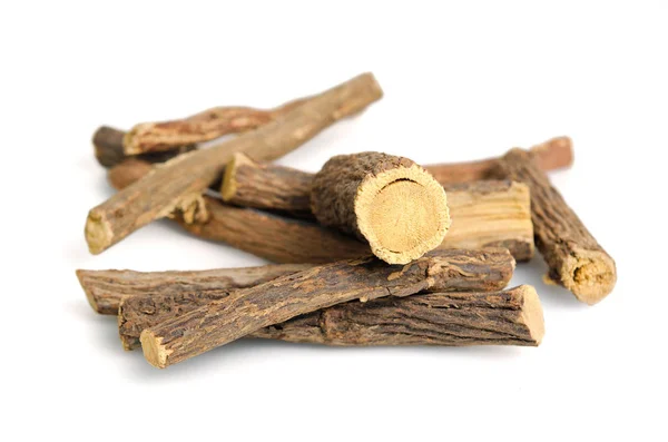 Licorice or liquorice root sticks isolated on white background — Stock Photo, Image