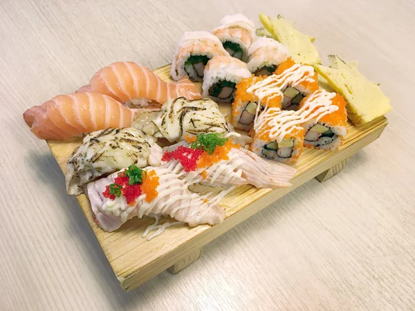 Japanese sushi rice roll set served on the wooden board