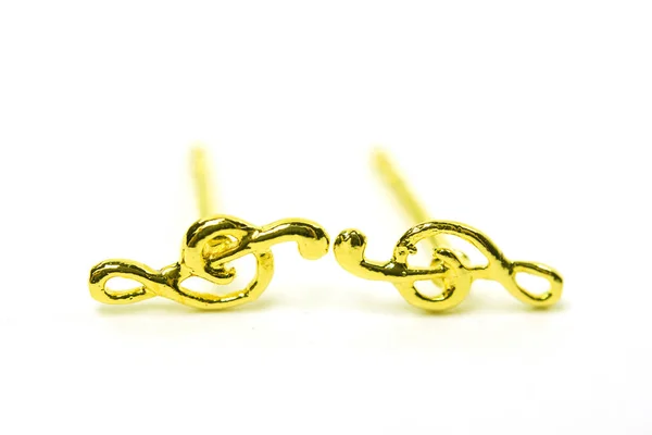 Zlatý přívěsek cameo náušnice šperky izolované na bílém — Stock fotografie