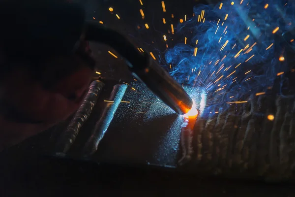 the welding spark light,close-up to the welding spark light