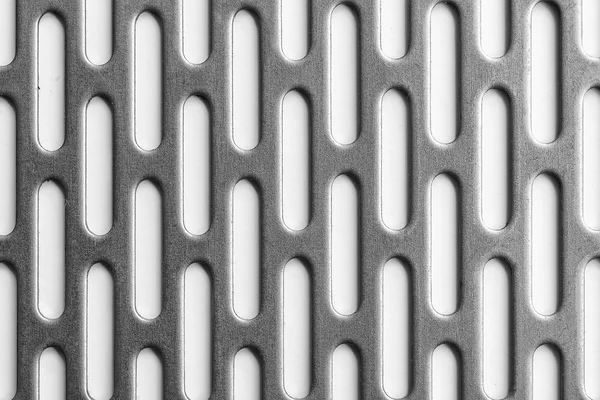 The silver metal plate with the holes,metal plate black and whit — Stock Photo, Image