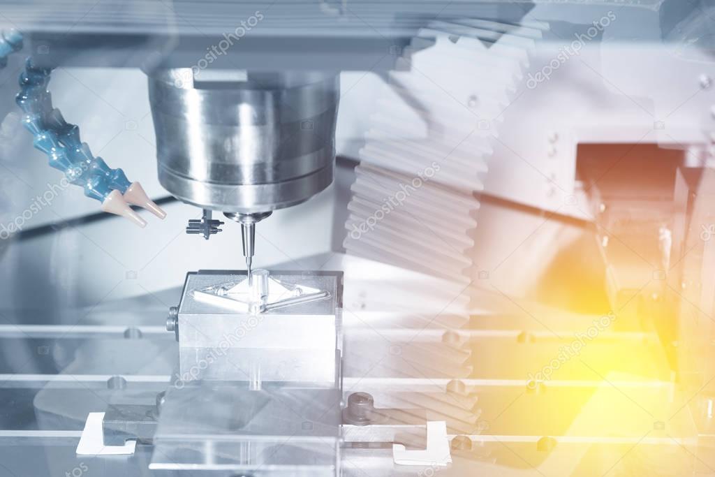 Abstract scene of the CNC milling machine while cutting sample