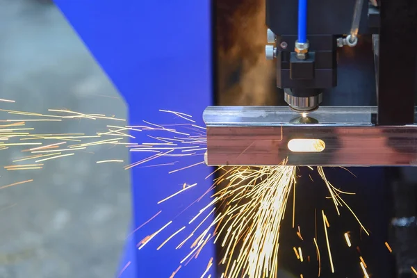 The laser cutting machine cutting the stainless square tube.