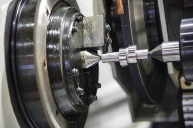 Kam mili parçası ile silindirik taşlama tezgahı.