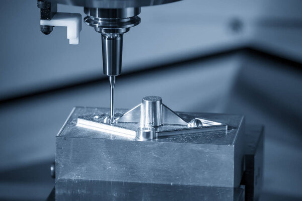 The CNC milling machine finishing cut the injection mold parts.