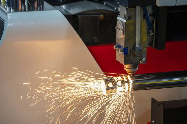 The fiber laser cutting machine cutting the stainless steel tube.