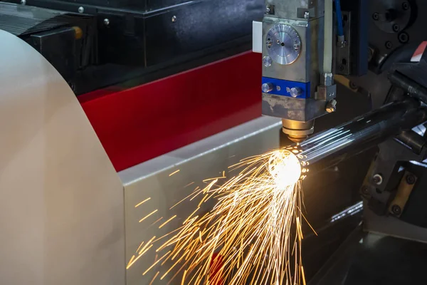 The fiber laser cutting machine cutting the stainless steel tube.