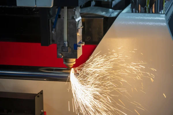 The fiber laser cutting machine cutting the stainless steel tube.