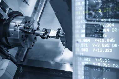 Otomatik robotik sistemli Cnc torna makinası, iş parçalarını kavradı. Cnc dönüşüm makinesi ve G-kod verilerinin soyut çalışma sahnesi. 